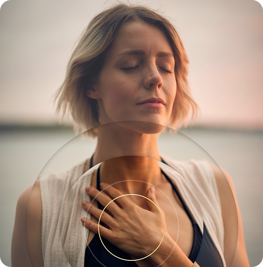 Woman in white top with golden circles
